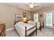 Comfortable bedroom featuring twin beds and access to a balcony at 172 Harper Lee St, Davidson, NC 28036