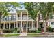Charming two-story brick home featuring double front porches and classic architectural details at 172 Harper Lee St, Davidson, NC 28036