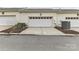 Attached single car garage providing convenient parking and additional storage space at 172 Harper Lee St, Davidson, NC 28036