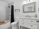 Well-lit bathroom with a vanity, tub, shower, and modern fixtures at 1758 Bridlewood Ct, Gastonia, NC 28054