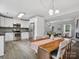 Open dining area with stainless steel appliances, white cabinets and a cozy atmosphere at 1758 Bridlewood Ct, Gastonia, NC 28054
