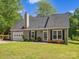 Charming single-story home featuring lush green lawn and mature landscaping at 1758 Bridlewood Ct, Gastonia, NC 28054