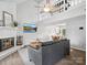 Bright living room with fireplace, vaulted ceiling, ceiling fan and open floor plan at 1758 Bridlewood Ct, Gastonia, NC 28054
