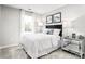 Relaxing bedroom featuring neutral colors, a plush bed, and bright natural lighting at 2067 Stephens Farm Dr # C, China Grove, NC 28023