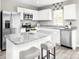 Beautiful kitchen features stainless steel appliances, gray counters and white cabinets at 2067 Stephens Farm Dr # C, China Grove, NC 28023