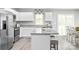 Bright eat-in kitchen features stainless steel appliances, gray counters, and access to the dining area at 2067 Stephens Farm Dr # C, China Grove, NC 28023