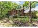 Stately brick home with a manicured front yard, charming landscaping, and inviting entrance at 208 Devonport Dr # 25, Weddington, NC 28104