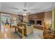 Cozy living room features a brick fireplace, built-in shelves, and natural light, perfect for Gathering gatherings at 208 Devonport Dr # 25, Weddington, NC 28104