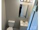 Compact bathroom featuring a modern vanity, updated fixtures, and a clean, efficient layout at 209 Brookview Rd, Statesville, NC 28625