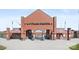 Exterior view of L.P. Frans Stadium, showcasing the brick facade and ticket booths at 2101 Stephens Farm Dr # E, China Grove, NC 28023