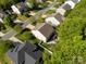 Aerial view of the home with a private backyard featuring a patio and play set at 246 Mallard Head Dr, Rock Hill, SC 29732