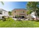 Spacious backyard with a paved patio area, fire pit, and swing set, perfect for outdoor gatherings at 246 Mallard Head Dr, Rock Hill, SC 29732