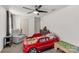 Fun, playful bedroom with car bed, neutral carpet, and abundant natural light at 246 Mallard Head Dr, Rock Hill, SC 29732