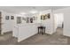 Bright hallway features neutral paint, plush carpet, and decorative elements at 246 Mallard Head Dr, Rock Hill, SC 29732