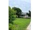 Home with a charming front porch and well-manicured lawn and landscaping at 2473 Greenwood Rd, Rock Hill, SC 29730