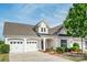 Charming home featuring a two-car garage and well-maintained landscaping at 3001 Henshaw Rd, Waxhaw, NC 28173