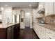 Modern kitchen featuring granite countertops and stainless steel appliances at 3001 Henshaw Rd, Waxhaw, NC 28173