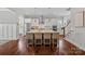 Stylish kitchen with stainless steel appliances, a center island with seating, and plenty of cabinet space at 309 Catawba Ave, Davidson, NC 28036