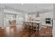 Modern kitchen with a large center island, stainless steel appliances, and a view to the dining area at 309 Catawba Ave, Davidson, NC 28036