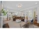 Bright and spacious living room with an open floor plan, chandelier, and comfortable seating at 309 Catawba Ave, Davidson, NC 28036