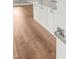 Partial kitchen view through the doorway and featuring luxury vinyl plank flooring at 320 Evans Nw St, Concord, NC 28027
