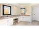 Bathroom with double vanity, granite counters, white cabinets, and a makeup vanity at 3200 Tallia Ct, Charlotte, NC 28269