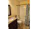 Bright bathroom with a granite vanity, a shower-tub combination, and a decorative shower curtain at 3200 Tallia Ct, Charlotte, NC 28269