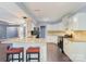 Open kitchen featuring a large island, white cabinets, and modern appliances; perfect for entertaining at 3200 Tallia Ct, Charlotte, NC 28269