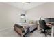 Cozy bedroom featuring a comfortable bed, natural light, and a functional workspace with monitors at 341 Pleasant Hill Se Dr, Concord, NC 28025