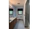 Traditional bathroom featuring a double sink, tiled floor, and blue accents at 370 Sherrill Farm Rd, Lincolnton, NC 28092