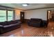 This living room offers hardwood floors and lots of natural light at 370 Sherrill Farm Rd, Lincolnton, NC 28092