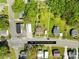 An aerial view shows the home's lot lines and positioning among the neighboring houses at 406 S Gaston St, Dallas, NC 28034