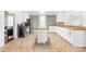 Open kitchen featuring butcher block countertops, stainless steel appliances, and tile floors at 406 S Gaston St, Dallas, NC 28034