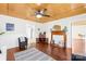 Spacious living room featuring hardwood floors, a fireplace, and a cozy atmosphere at 406 S Gaston St, Dallas, NC 28034