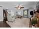 Spacious living room with hardwood floors, fireplace and a plush rug at 4611 Cringle Ct, Charlotte, NC 28226
