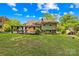 Spacious backyard featuring a gazebo and a brick patio, ideal for outdoor entertaining at 4901 White Oak Rd, Charlotte, NC 28210