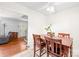 Inviting dining room featuring tile flooring and a wooden table set beneath a ceiling fan at 4901 White Oak Rd, Charlotte, NC 28210