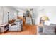 Spacious living room with hardwood floors and stairs leading to the upper level at 4901 White Oak Rd, Charlotte, NC 28210