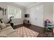 Versatile bonus room perfect for a home gym or playroom with lots of natural light at 615 Welker St, Charlotte, NC 28204