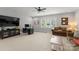The large living room has lots of light, media center and great carpet at 615 Welker St, Charlotte, NC 28204