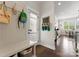 Functional mudroom featuring ample storage, coat racks, and easy access to the kitchen at 615 Welker St, Charlotte, NC 28204