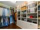 This walk-in closet boasts a custom organization system and ample storage shelves at 615 Welker St, Charlotte, NC 28204