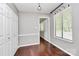Bedroom with window, closet, and hardwood floors at 6712 Santa Maria Ln, Charlotte, NC 28227