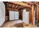 Spacious garage offers ample storage and functionality with a white cabinet, shelves, and a white garage door at 6712 Santa Maria Ln, Charlotte, NC 28227