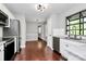 Bright kitchen with stainless steel appliances and hardwood floors throughout the home at 6712 Santa Maria Ln, Charlotte, NC 28227