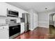 Kitchen with stainless steel refrigerator, microwave, and range at 6712 Santa Maria Ln, Charlotte, NC 28227