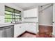 The kitchen has white cabinets, stainless steel dishwasher, and subway tile backsplash at 6712 Santa Maria Ln, Charlotte, NC 28227