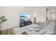 Spacious living area featuring modern furnishings, natural light, and an open layout at 7004 Everly Commons Ln, Tega Cay, SC 29708