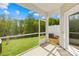 Screened-in patio offers a serene view of the backyard at 7004 Everly Commons Ln, Tega Cay, SC 29708