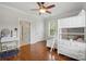 Bright bedroom with hardwood floors, bunk beds, a vanity, and natural light at 725 Bradshaw Rd, Mt Ulla, NC 28125